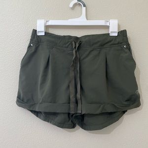 Green athletic shorts